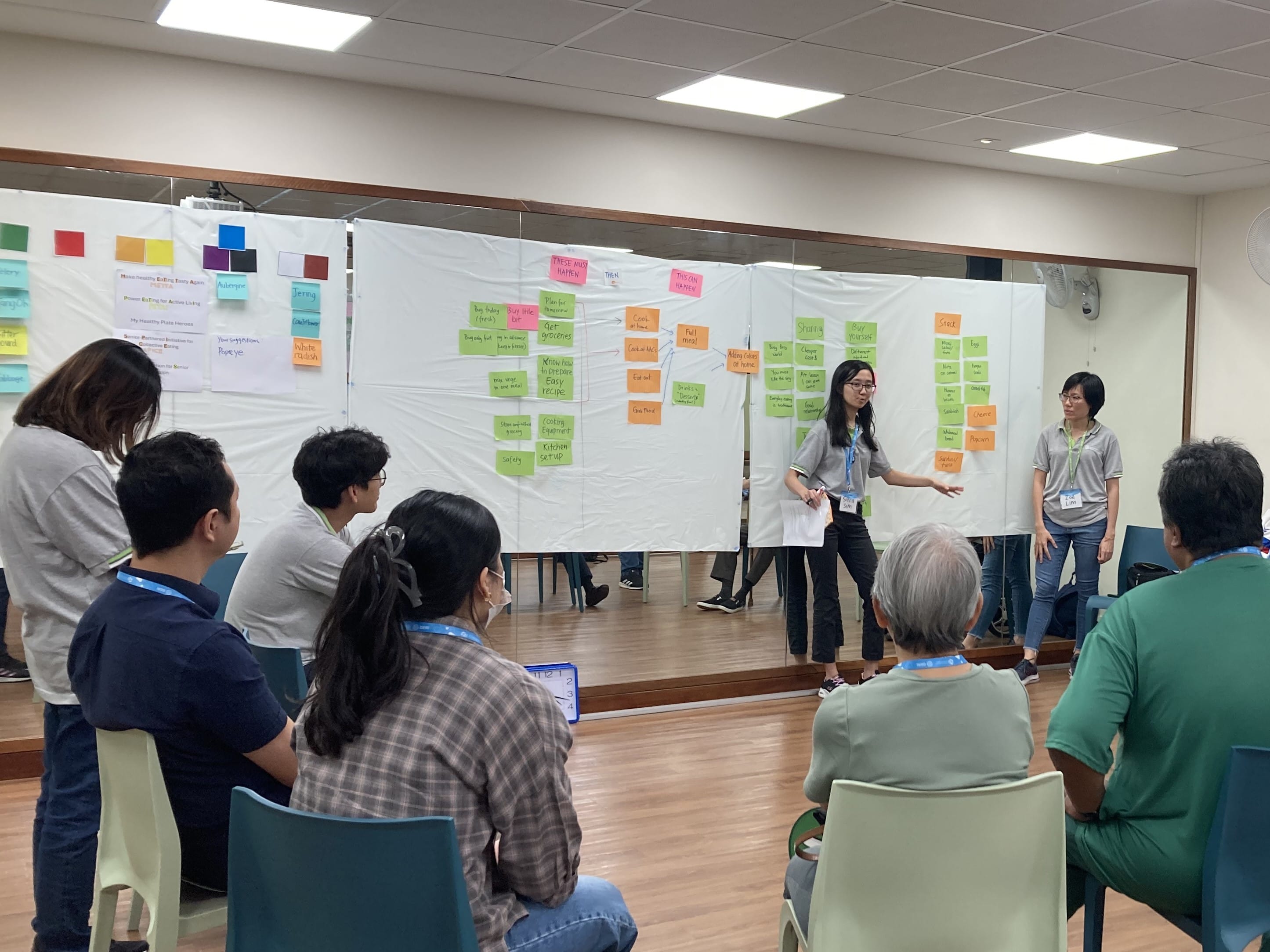 A group of people in a meeting